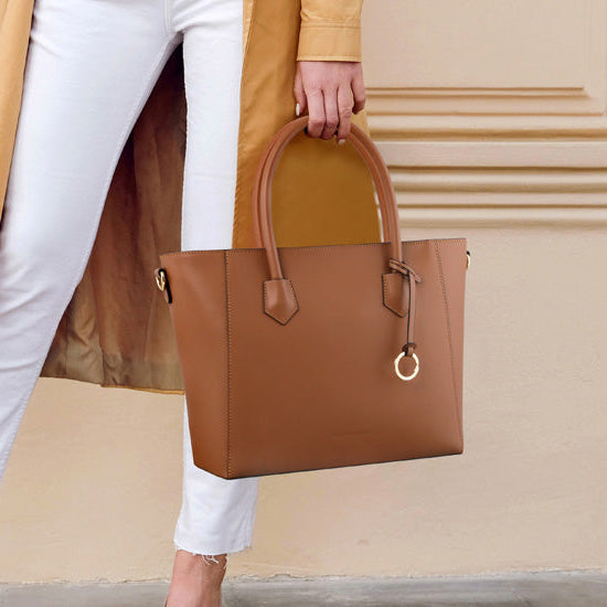 A Comparative Guide to Tuscany Leather vs Other Italian Leather Bags