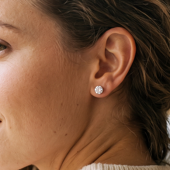 Woman turning her head to reveal a lab grown diamond stud earring