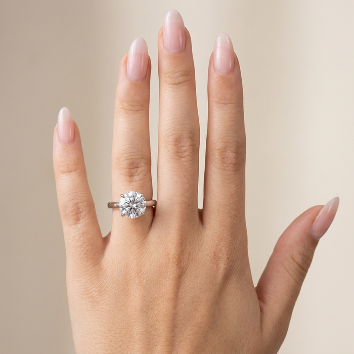 Hand wearing ring
