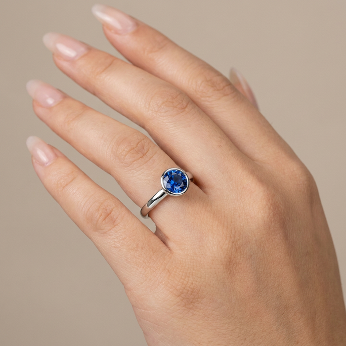 Hand wearing ring