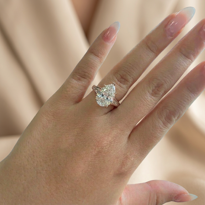 Hand wearing ring