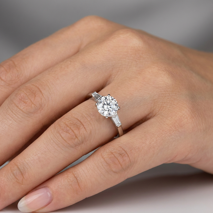 Hand wearing ring