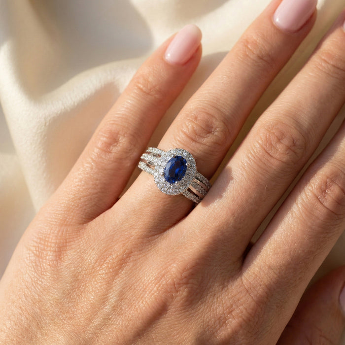 LADIES RING 1.65CT ROUND/BLUE SAPPHIRE OVAL DIAMOND 14K WHITE GOLD (CENTER STONE 0.94CT BLUE SAPPHIRE OVAL DIAMOND)