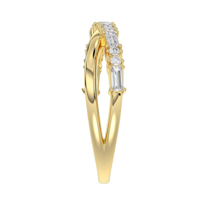 Elegant 10K Yellow Gold Ladies Crossover Ring Featuring Alternating Round And Baguette Diamonds 0.20 Ct. A Modern Fine Jewelry Design For Women.