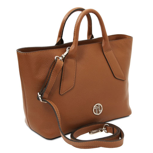 Viva brown pebbled leather handbag with detachable shoulder strap, angled view.