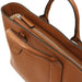 Viva brown pebbled leather handbag open top showing zip closure and interior lining.